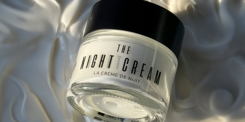 An image of The Night Cream product lay down on its side in the products creamy texture