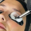 Brow and Lash Cleansing Primer Foam on eye and brush